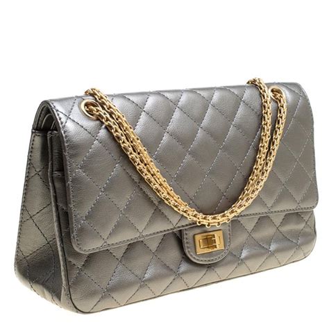 chanel quilted 2.55 bag|Chanel quilted reissue shoulder bag.